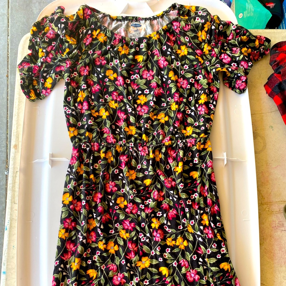 Gently used kids dress size XL black with flowers